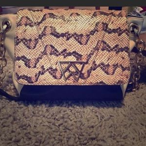 Kelly Wynne Python handbag